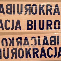 BIUROKRACJA, 2001, nadruk na taśmie klejącej. Wystawa zbiorowa “Biurokracja” , Galeria Foksal, Warszawa